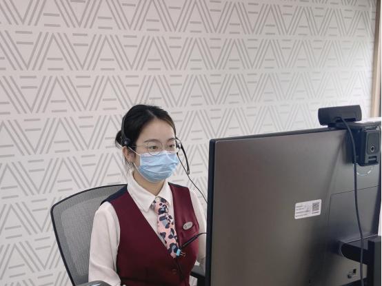 Click to see a bigger picture. Figure 1: Ping An Life Insurance Company of China customer service teller remotely handles business for customers through online video of "Sky Store"